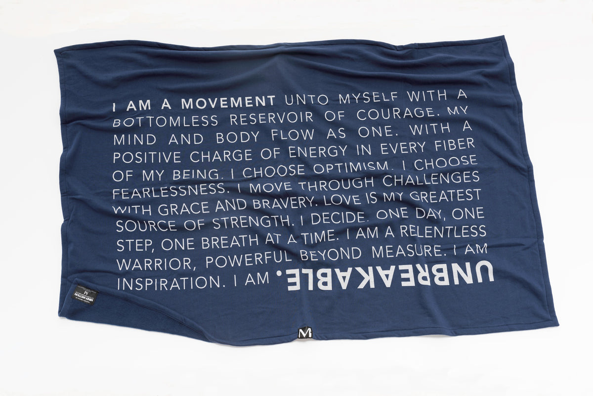 Extra soft, polycotton blended fleece blanket with UNBREAKABLE manifesto. Navy.. 