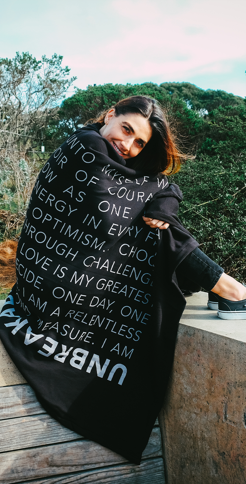 UNBREAKABLE BLANKET. Wrap yourself or someone you love in this soothing blanket of inspiration. This polycotton blended fleece blanket is designed to lift spirits, making it the perfect gift for friends and family.